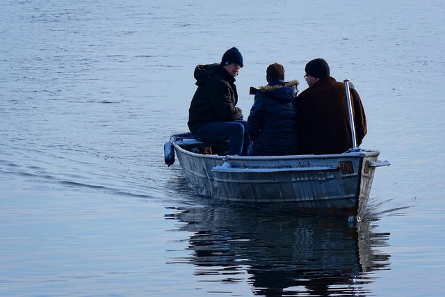An image capturing the joy of a winter boat ride, as a family cruises on calm waters adorned with shimmering ice crystals
