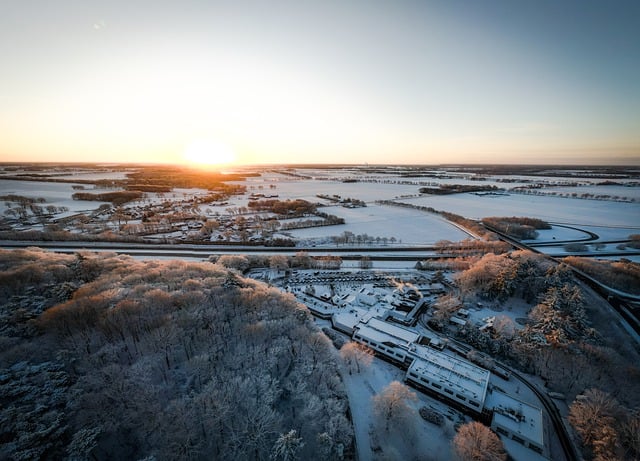  a serene winter scene in a picturesque countryside park
